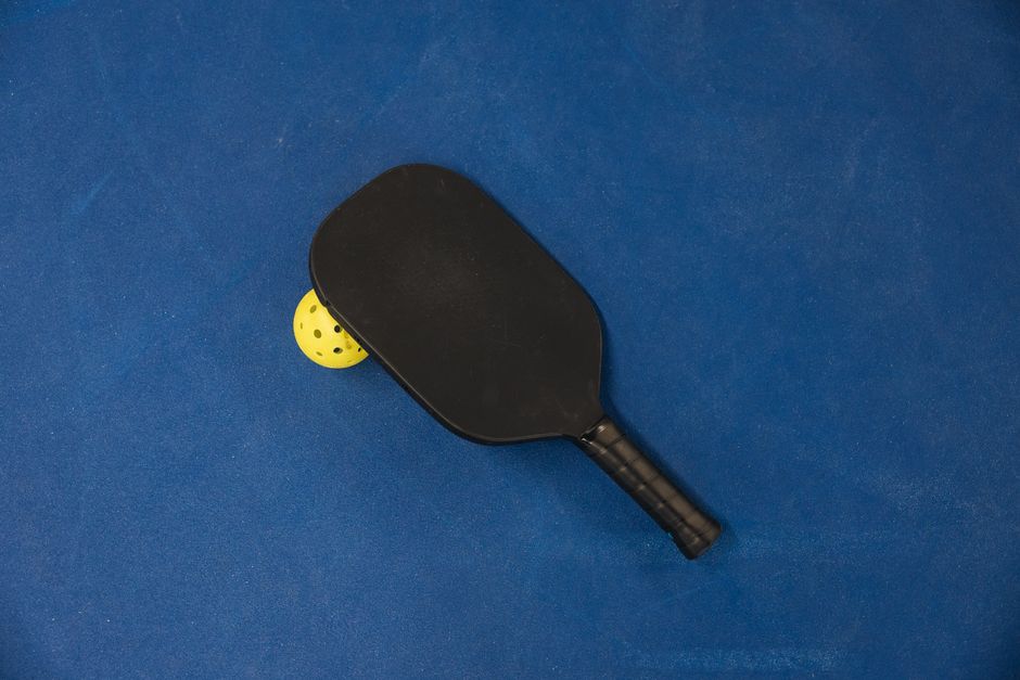 Close-up of a padel racket face and surface texture